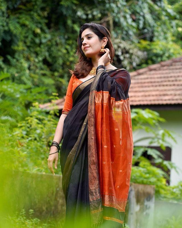 Black & Orange Soft Linen Saree With Zari Weaving Work