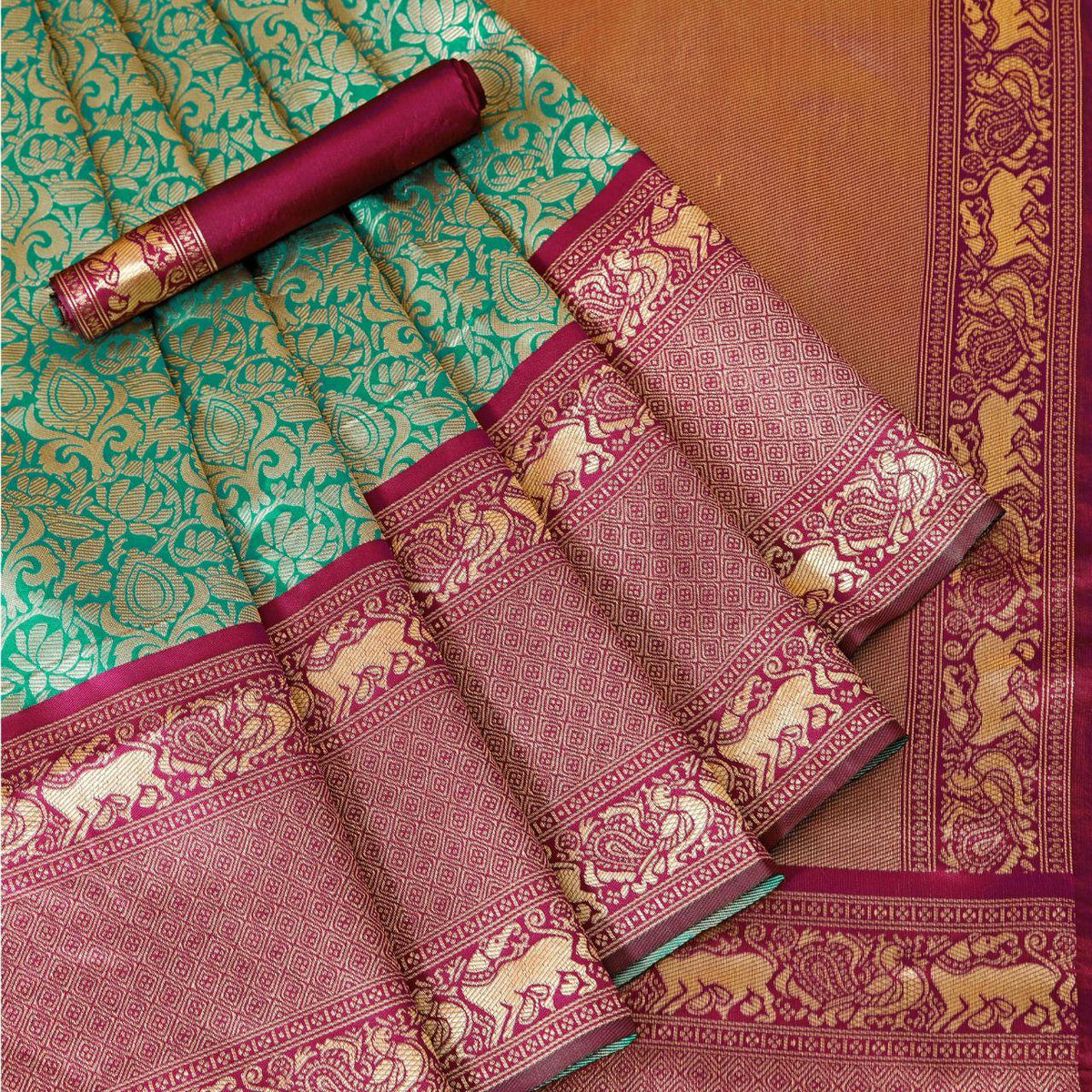 Floral aqua Kanjivaram saree with Contrast Zari & Jacqaurd Border